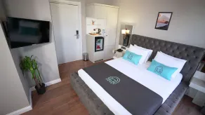 Homey AirPort Hotel - Chambre