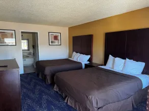GuestPlace Inn & Suites - Chambre