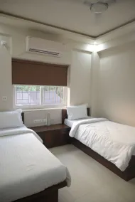 Yuvi Grand Residency - Chambre