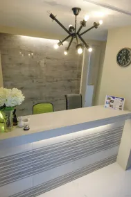 Ambien's Place Residential Hotel - Rezeption