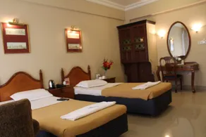 Hotel Pooja International - Chambre