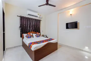 Fabhotel Lucky Inn Grand Residency - Chambre