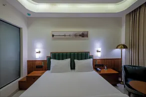 Hotel Idyllic Inn - Zimmer