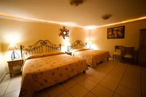 Hotel Hacienda del Sol - Habitación