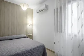 Apartamentos San Pedro - Chambre