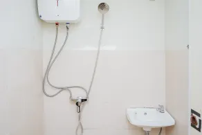 Homey Studio Apartment at Green Palm Residence By Travelio - Bathroom