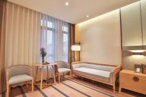 SSAW Boutique Hotel Qidong Tiansheng - Zimmer