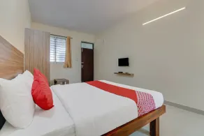 OYO Flagship 29620 New Champion Residency - Quarto