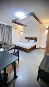 Armaan Suites and Restaurant - Zimmer