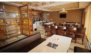 Fabhotel Siya Residency - Restaurante