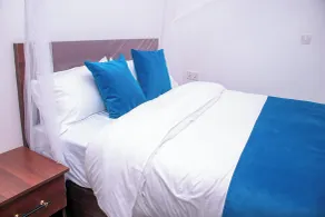 Goshen Paradise Hotel - Chambre