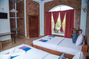 The Coconut House Hotel - Room