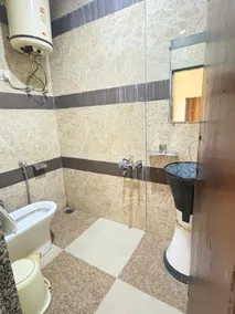 Rudrakshi Inn - Bathroom