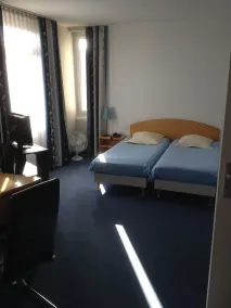 Amadeus Hotel - Zimmer