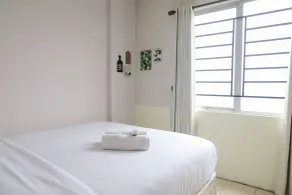 Homey 2BR Apartment at The Edge Bandung By Travelio - Room