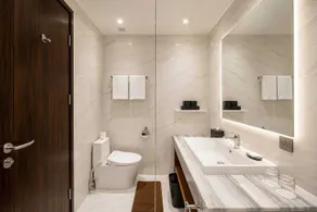 Grand Travello Hotel Bekasi - Badezimmer