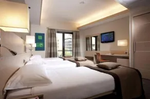 iQ Hotel Roma - Zimmer