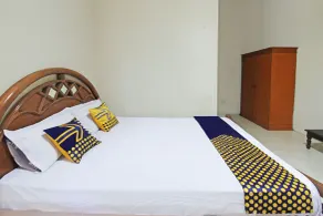 SPOT ON 92973 Madani Syariah Guesthouse - Room