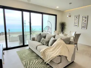 Seafront Condo Pool and Jacuzzi - Living area