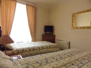 The Central Guest House - Habitación