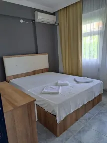 Tomris Apart - Habitación