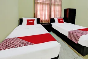 Hotel O Unram Guest House - Chambre