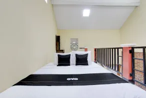 Capital O 93716 Family Guesthouse Syariah - Habitación