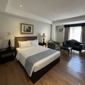 Queen Margarette Hotel - Chambre