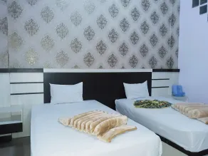Trivadoh Syariah Hotel - Værelse
