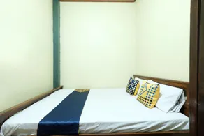 SPOT ON 92068 Pudja Kesuma Homestay Syariah Yogyakarta - Værelse