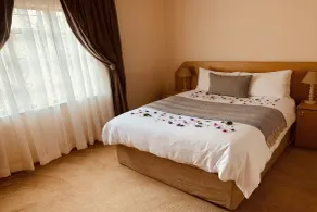 Khutsong Lodge - Room