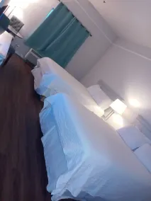 Deluxe 6 Inn & Suites - Rom
