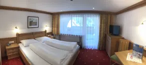 Hotel Garni Central - Zimmer - Studios - Apartments - Værelse