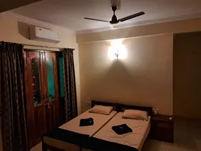 D'souza's Guest House - Zimmer