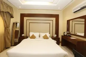 Hotelier Suites by Cantonal - Room