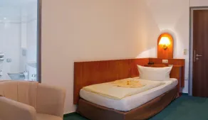 REGIOHOTEL Quedlinburger Hof - #HistorischerCharme #ZentraleLage #Wellness #FreeParking - Chambre