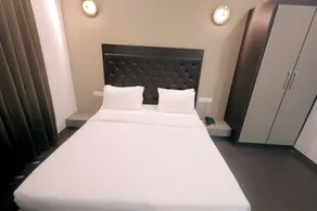 Palmgreens Suites & Banquet - Quarto