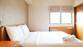 Extra Spacious and Homey 2BR at Kondominium Puncak Marina Apartment By Travelio - Zimmer