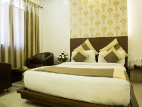 Aishwarya Suites - Chambre