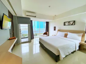 Harper MT Haryono by ASTON - Room