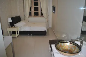 Jayleen Clarke Quay Hotel - Habitación