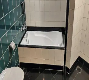 Quaint Suites Hotel & Banquet - Bagno