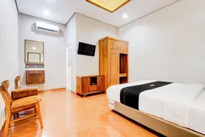 Capital O 93994 Dalem Kamulyan Syariah Guest House - Værelse
