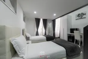 Arch Rome Suites - Chambre
