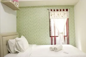 Spacious and Stylish 1BR Gateway Ahmad Yani Cicadas Apartment By Travelio - Værelse