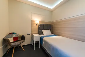 Amrita Hotel - Habitación