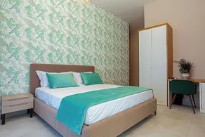 Toto Hotel & Apartments - Chambre