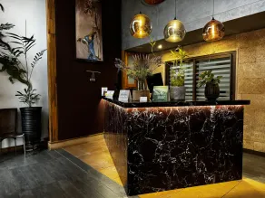 Roots Hotel Apartment - Reception