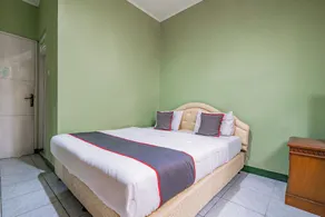 Capital O 93949 Hotel Popuci By Pupa Hospitality - Room