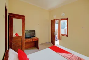 OYO 92952 Nirmala Guest House - Habitación